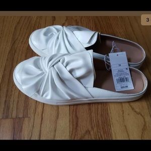 A. new. day.  Rare and super cute with the twist.